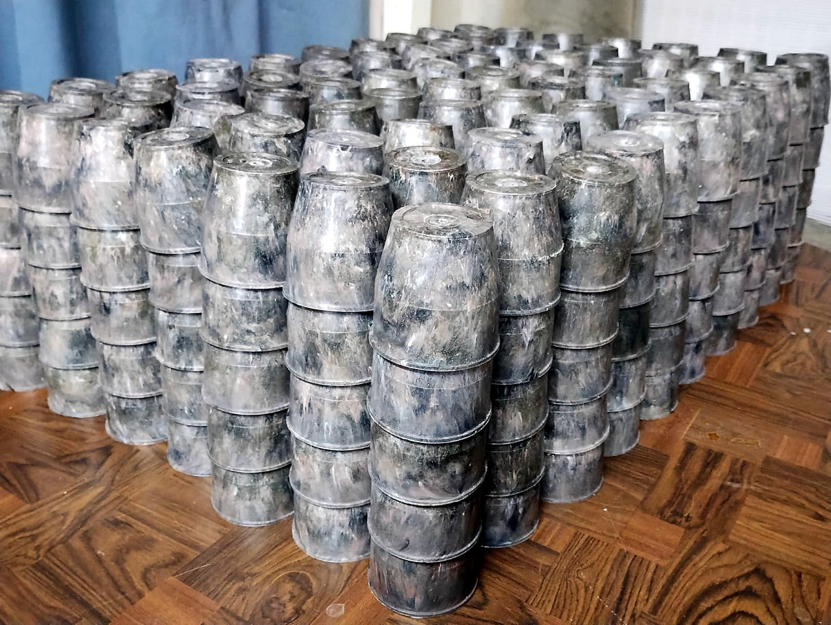 Lote de macetas fabricadas con material recuperado de cápsulas Dolce Gusto
